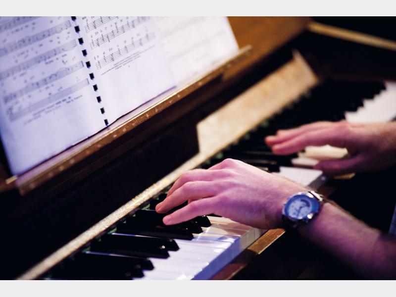 Piano student in class